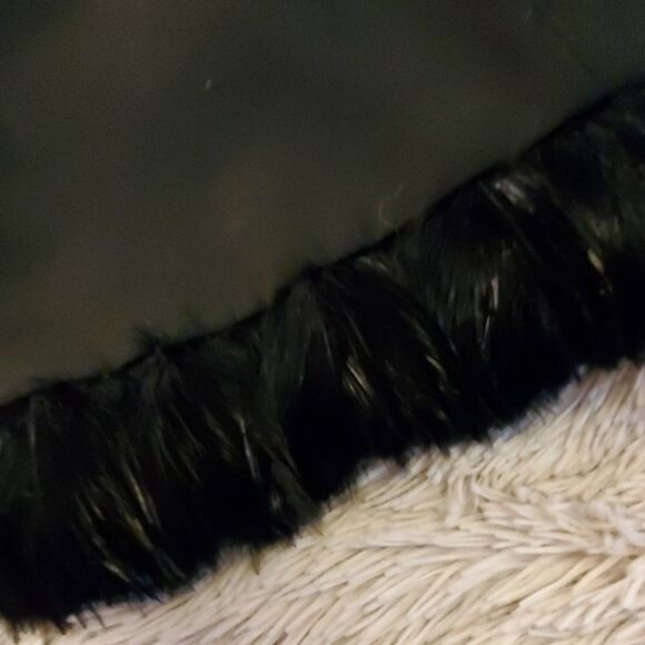 Fun black pencil skirt with feather lined bottom - Picture 5 of 7